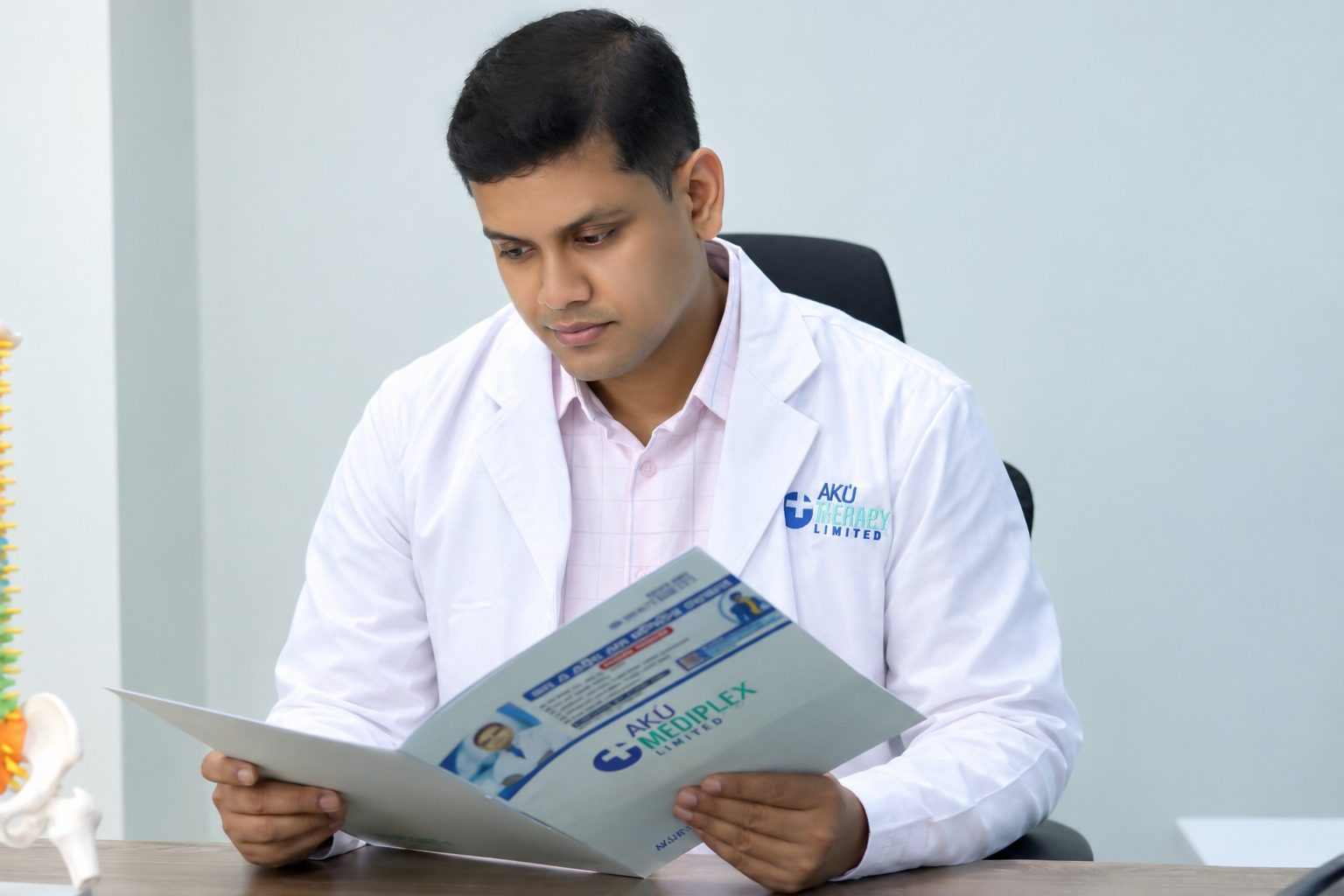 Reviewing reports — Every X-ray and MRI is reviewed before the plan is made